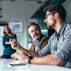 men and woman in meeting